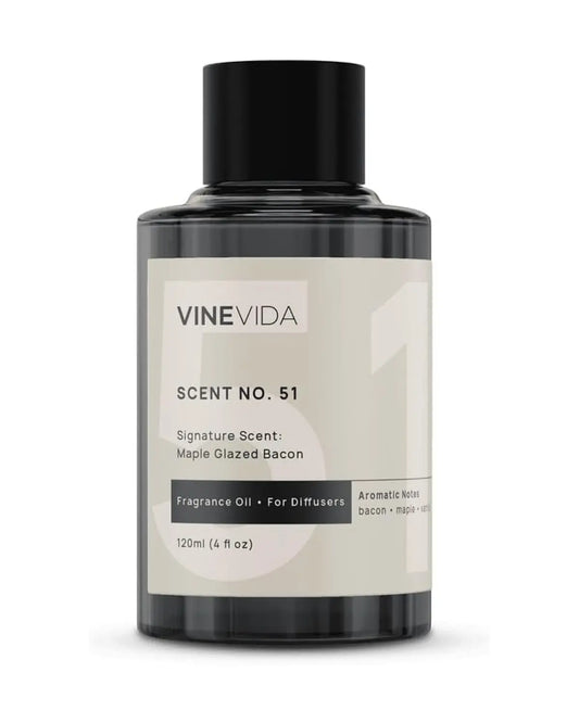 Close-up of the 4 fl oz fragrance oil bottle, highlighting the scent name on the label.