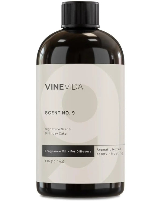 Close-up of the bottle's label, explicitly stating "Birthday Cake Fragrance Oil" and volume.