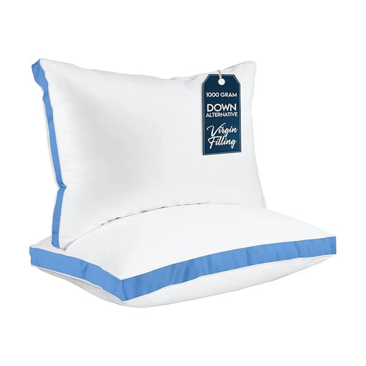 Close-up of the smooth blue fabric and crisp gusseted edge of a single bed pillow.