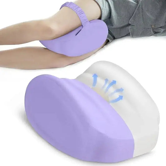 Side view of the memory foam leg pillow with an adjustable securing strap for stability.
