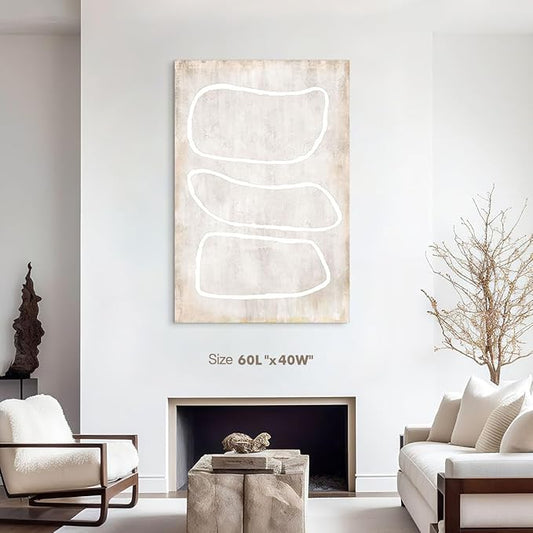 Close-up of the beige art painting, highlighting the subtle textures and circular patterns.