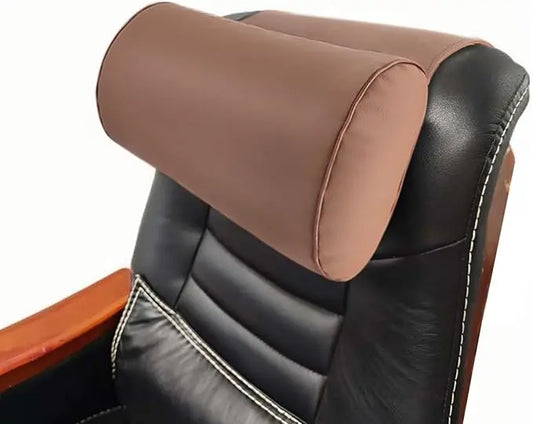 Close-up of the brown faux leather texture, showing the soft, smooth finish of the pillow.
