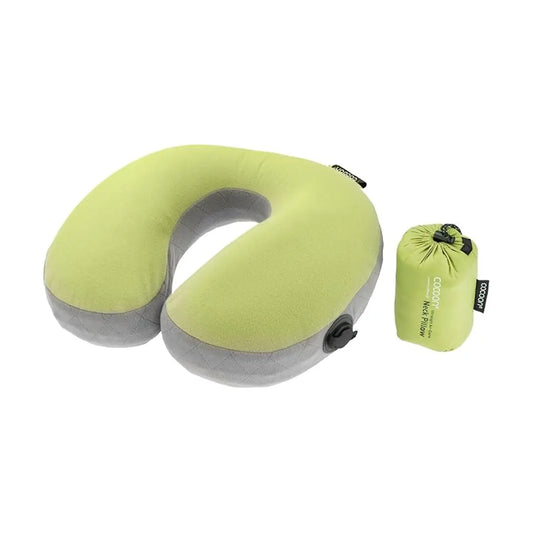 A U-shaped Aircore travel pillow in a vibrant wasabi green color, shown fully inflated for comfort.