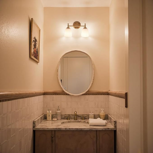 Angled shot of the vintage wall lamp, highlighting the elegant brass finish and soft milk glass shades.