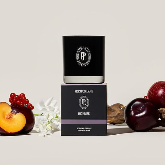 Close-up of the two wicks and smooth vegan soy wax blend surface inside the glass candle.