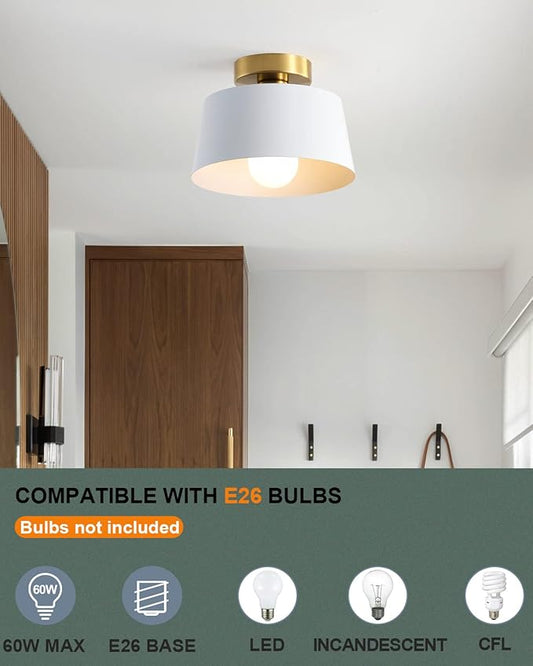 Close-up of one light fixture's white shade, highlighting its modern simple style.