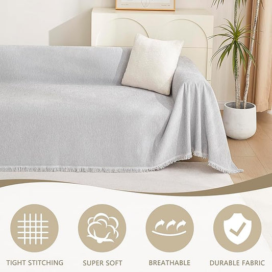 Close-up of the thick, durable light grey sofa cover fabric with a subtle woven pattern.