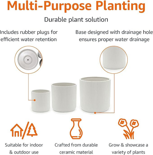Individual view of the largest 10-inch white fluted ceramic planter with a plant.