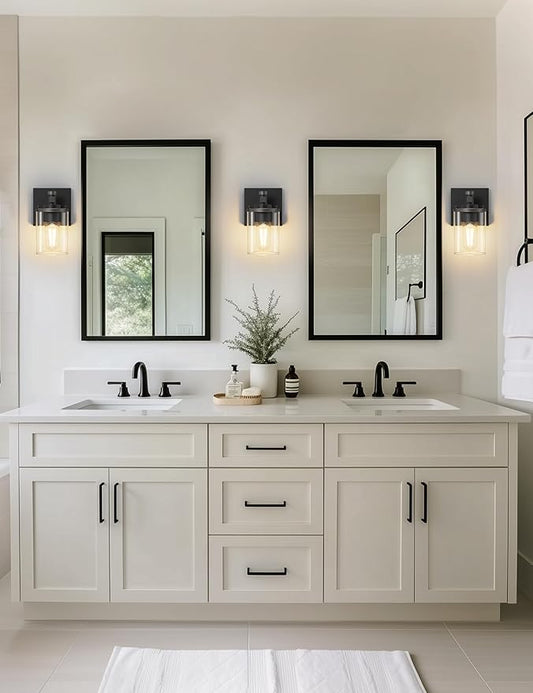 Close-up of the clear cylindrical glass shade, revealing the bulb socket inside.