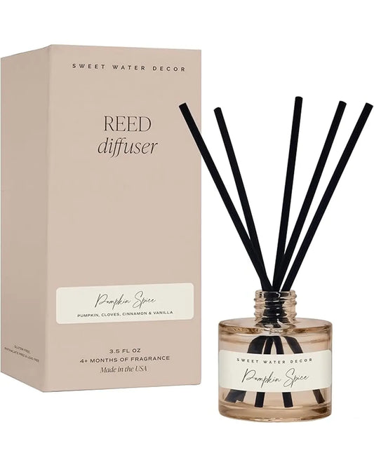 Close-up of the diffuser bottle, filled with the non-toxic, autumn-scented oil.