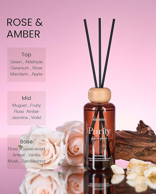 The reed diffuser set creating a warm, subtle fragrance in a cozy bedroom setting.