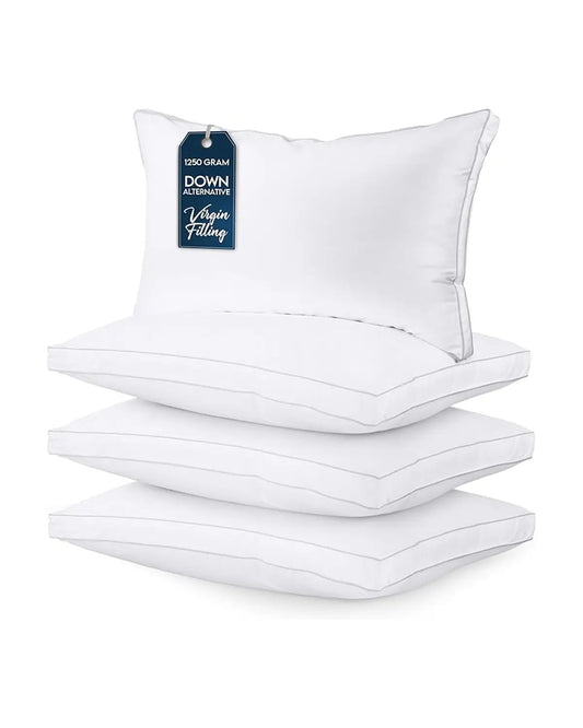 Close-up of the smooth white fabric and crisp gusseted edge of a single bed pillow.