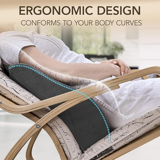 The lumbar pillow placed on a recliner, demonstrating comfortable back support for elderly users.