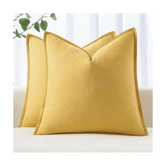 Close-up of the yellow linen fabric, highlighting its natural texture and subtle weave.