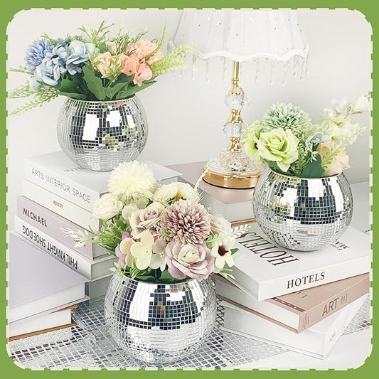 Close-up of a single disco ball vase, showcasing its reflective mirror tiles and unique texture.