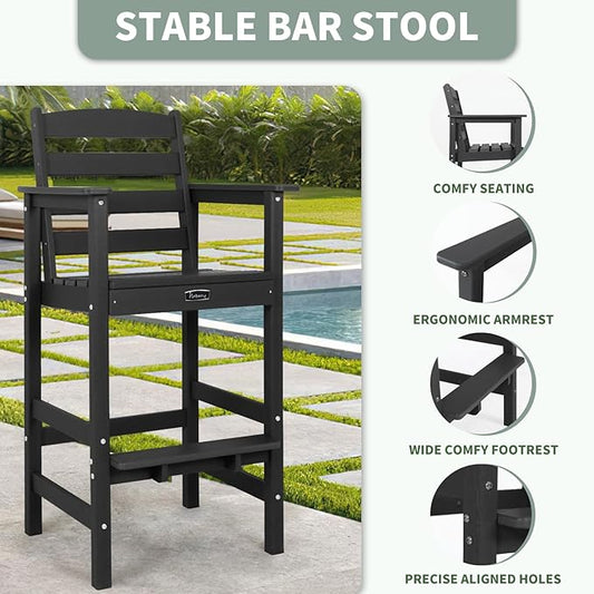 Two dark gray bar height Adirondack chairs are positioned on a modern patio with a small round bistro table, ready for o