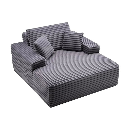 Close-up of the modern upholstered fabric and deep seat of the lounge chair.