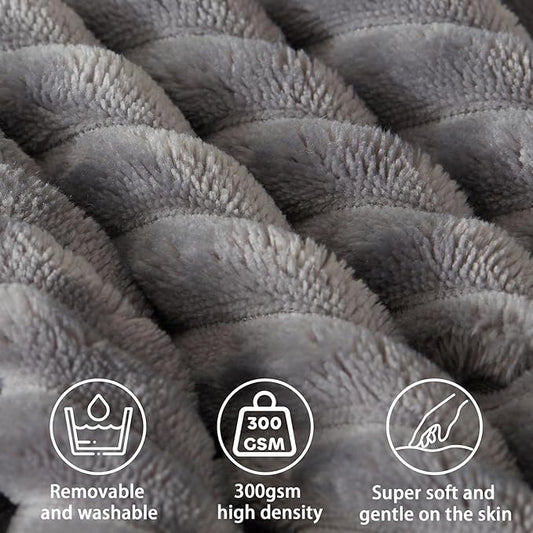 Angled shot of the large gray reading pillow, showcasing its supportive triangular shape.