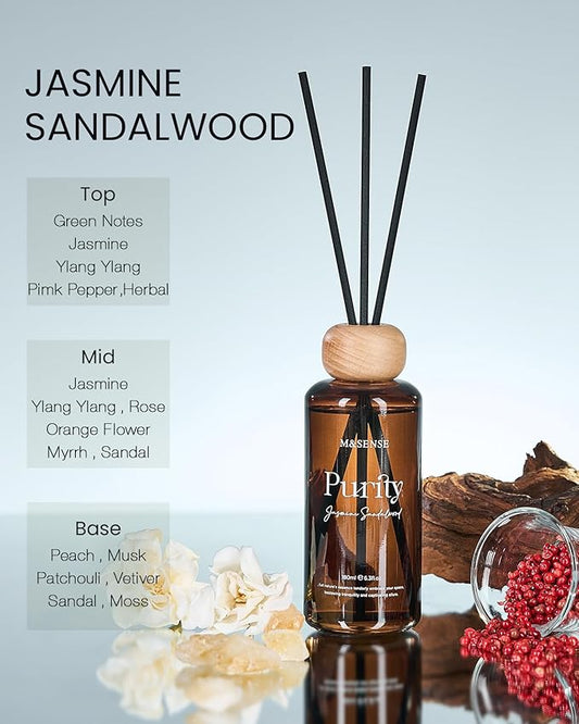 Close-up of the reed diffuser bottle with natural rattan sticks, showcasing the subtle fragrance.