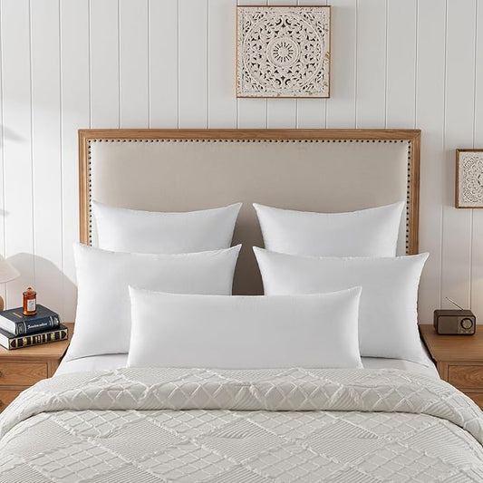 Close-up of a single 20x20 down feather pillow insert, showing the soft cotton fabric cover.