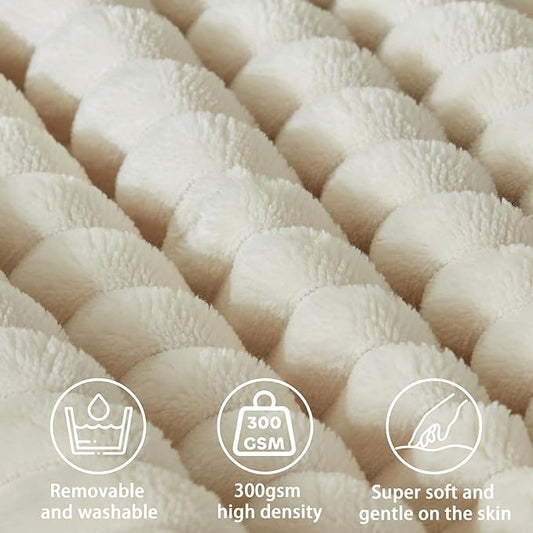 Angled shot of the large beige reading pillow, showcasing its supportive triangular shape.