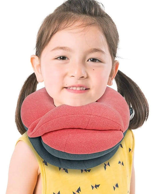 Small pink and grey kids travel neck pillow with 360° head support design.