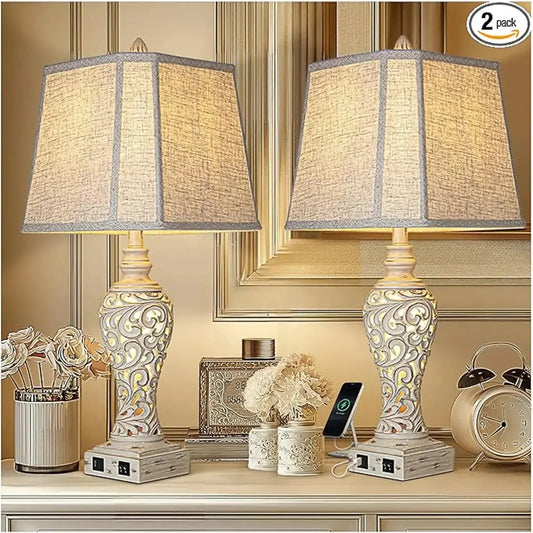 Full view of a 28.5-inch table lamp with a fabric shade, illuminated, on a bedside table.