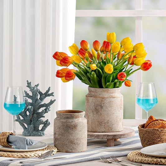 Close-up of the handcrafted pottery texture and natural finish of the terracotta vase.