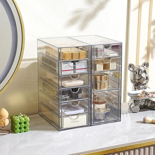 The 10-drawer acrylic organizer displayed on an office desk, filled with various supplies.
