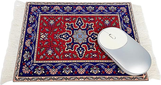 Close-up of a single Persian rug mouse pad showing its intricate pattern and fringe.