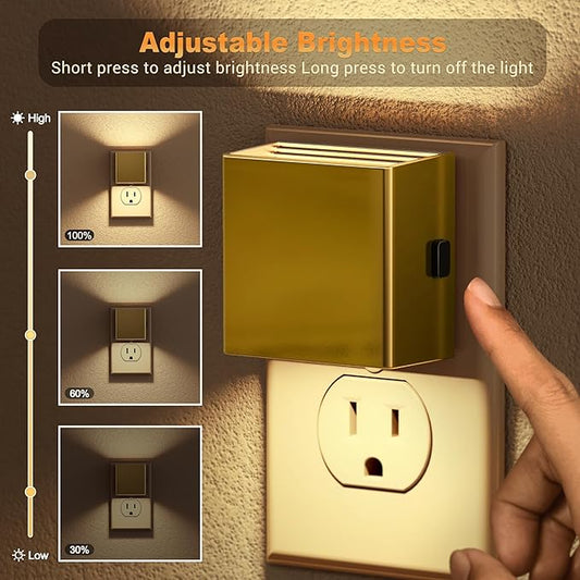 Close-up of a night light plugged into a wall outlet, emitting a soft white glow in a dark room.