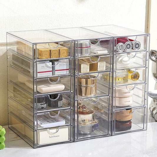 The 15-drawer acrylic organizer displayed on an office desk, filled with various supplies.