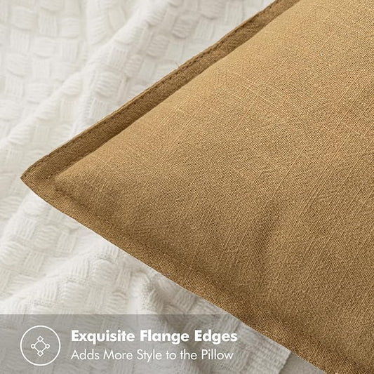 Close-up view of the mustard yellow linen fabric, highlighting its subtle woven texture.