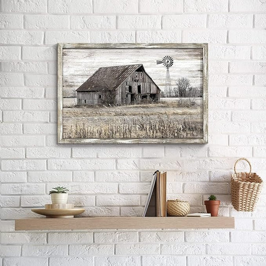 Close-up of the textured wood frame surrounding the farmhouse style landscape print.