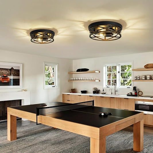 Close-up of the ceiling light's open metal cage design, showing E26 bulb sockets.