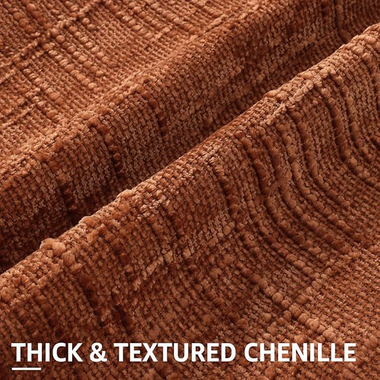 Close-up detail of the rust chenille fabric, showing its unique thick, textured, and slubby weave.