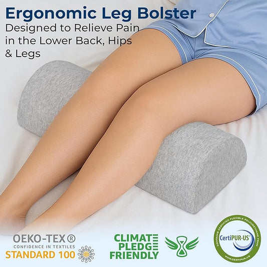 The large knee pillow positioned under the legs, offering back sleeping support.