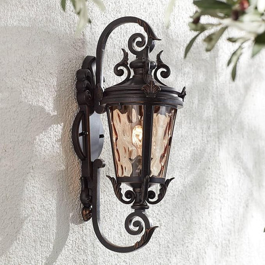 Full front view of the bronze outdoor sconce, highlighting its classic lines and decorative elements.