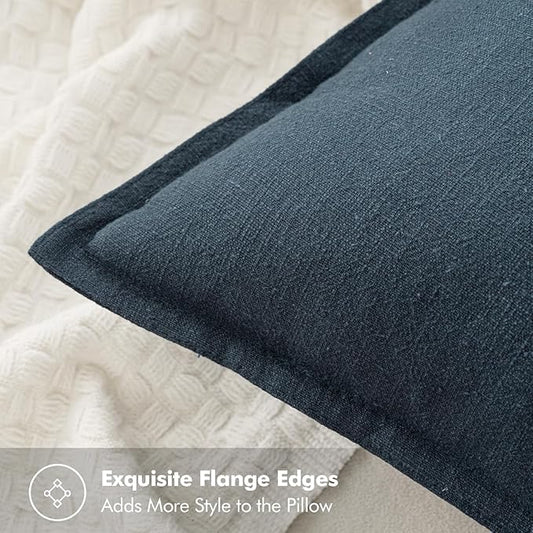 Close-up on the textured navy blue linen fabric, revealing its natural fibers and deep, rich color.
