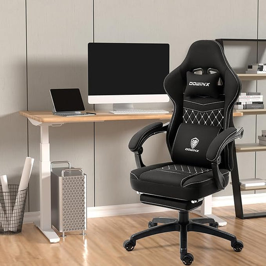 Angled view of the ergonomic black gaming chair, highlighting its comfortable design.