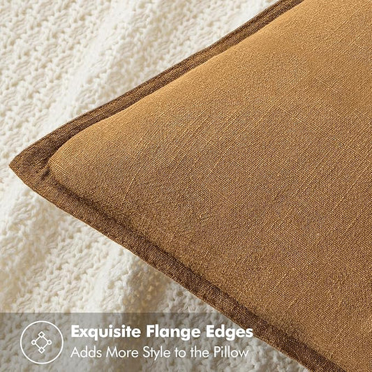 Two hazel linen pillow covers arranged on a cozy armchair, complementing the room's decor.