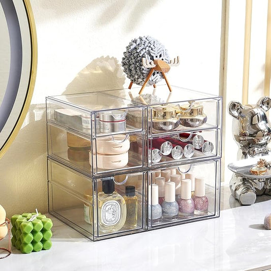 The 6-drawer acrylic organizer displayed on an office desk, filled with various supplies.