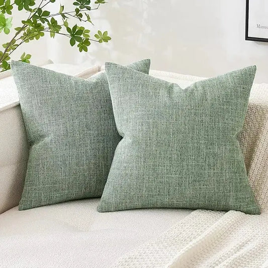 Close-up view of the natural sage green linen burlap fabric texture of the cover.