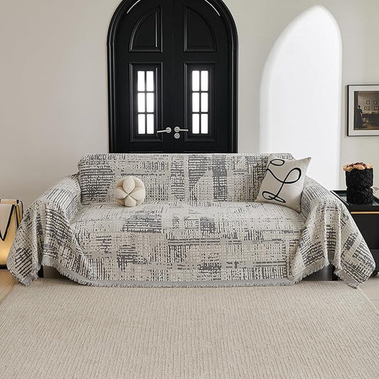 Close-up showing the soft chenille texture and unique light grey artistic gradient pattern.