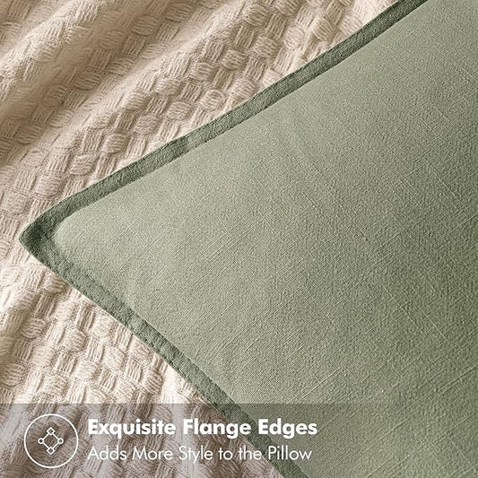 Detailed view of the sage green linen fabric, showcasing its subtle texture and calming color.