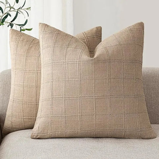 Close-up view of the camel linen fabric, showing the intricate check pattern and texture.