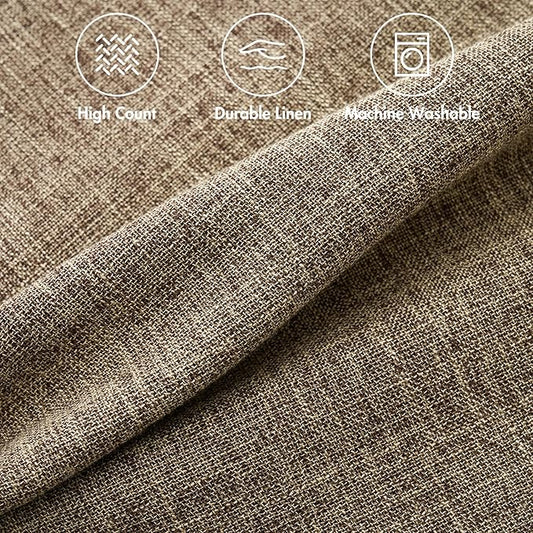 A single brown farmhouse boho pillow cover styled on a sofa, adding warmth.