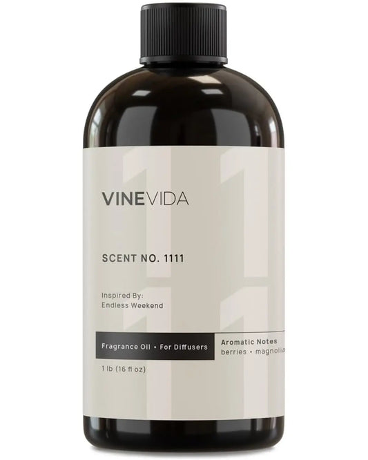 Bottle of fragrance oil, Scent NO. 1111, with raspberry, magnolia, vanilla notes on label.