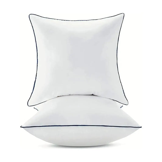 Two 18x18 inch throw pillow inserts with 100% cotton covers, stacked for display.