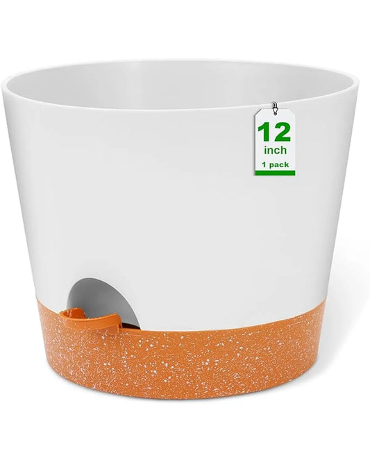 A 12-inch white self-watering plastic planter, suitable for large indoor or outdoor flowers.
